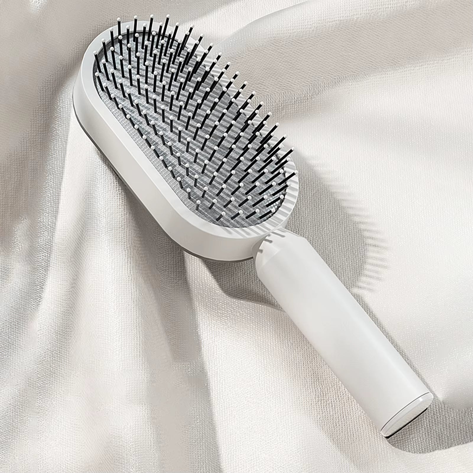 Paddelborste med luftkudde – Skonsam hårborste med massageeffekt